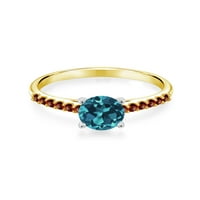 Gem Stone King 1. CT Okrugli London Blue Topaz Red Garnet 10k žuti zlatni prsten sa bijelim zlatnim
